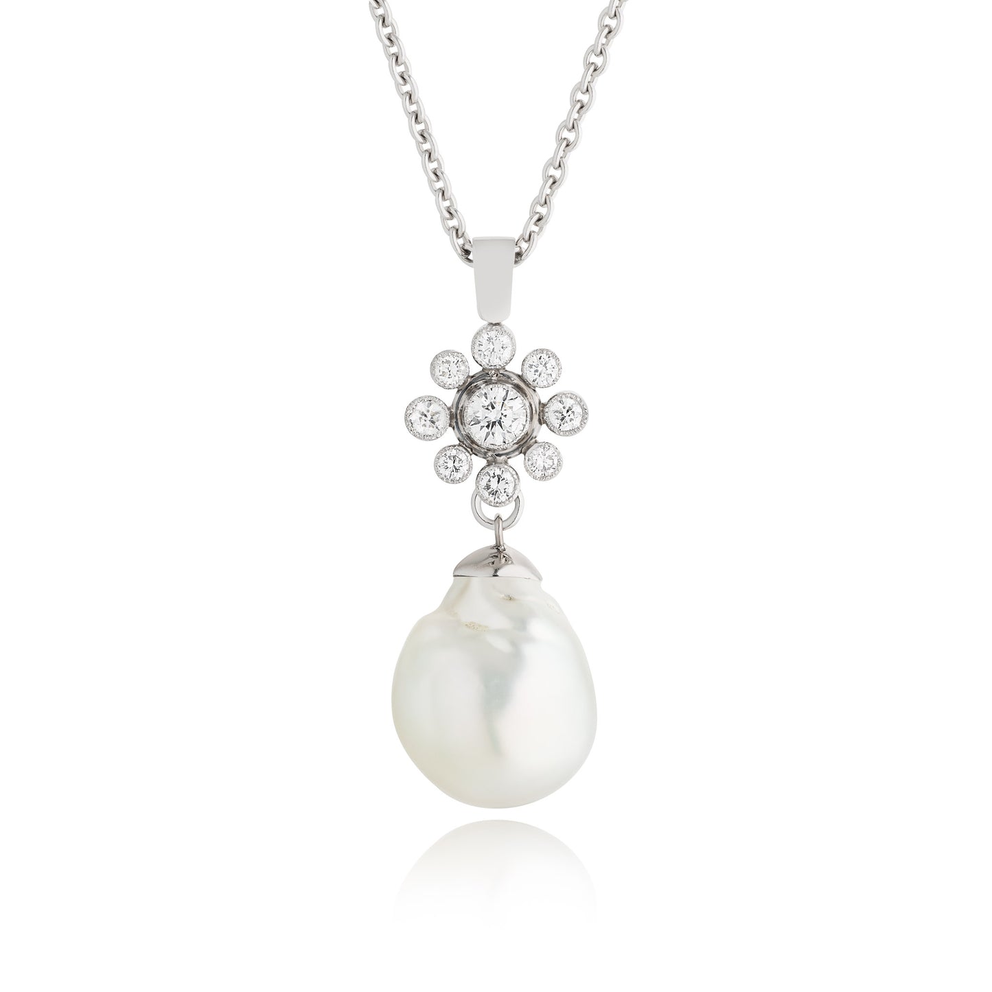 A Diamond Floral Cluster Diamond and Pearl Pendant